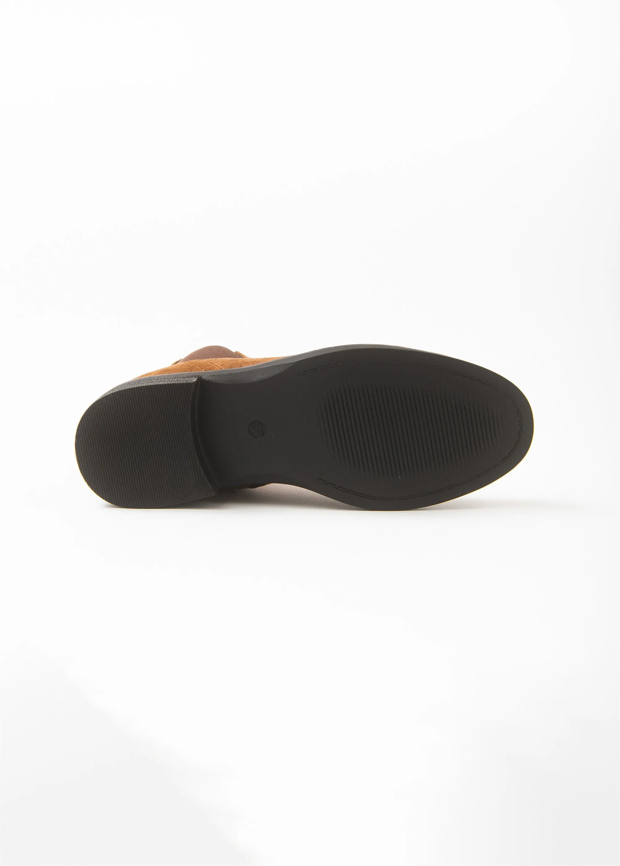 Beige Chelsea boots with elasticated sides
