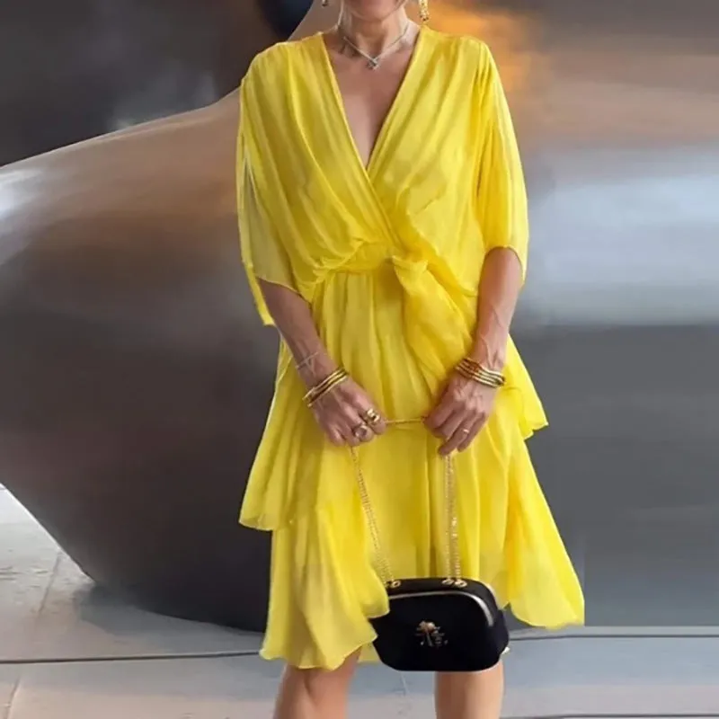 Elegant Flowing Chiffon Wrap Dress with Cascading Ruffles and Bat Sleeves