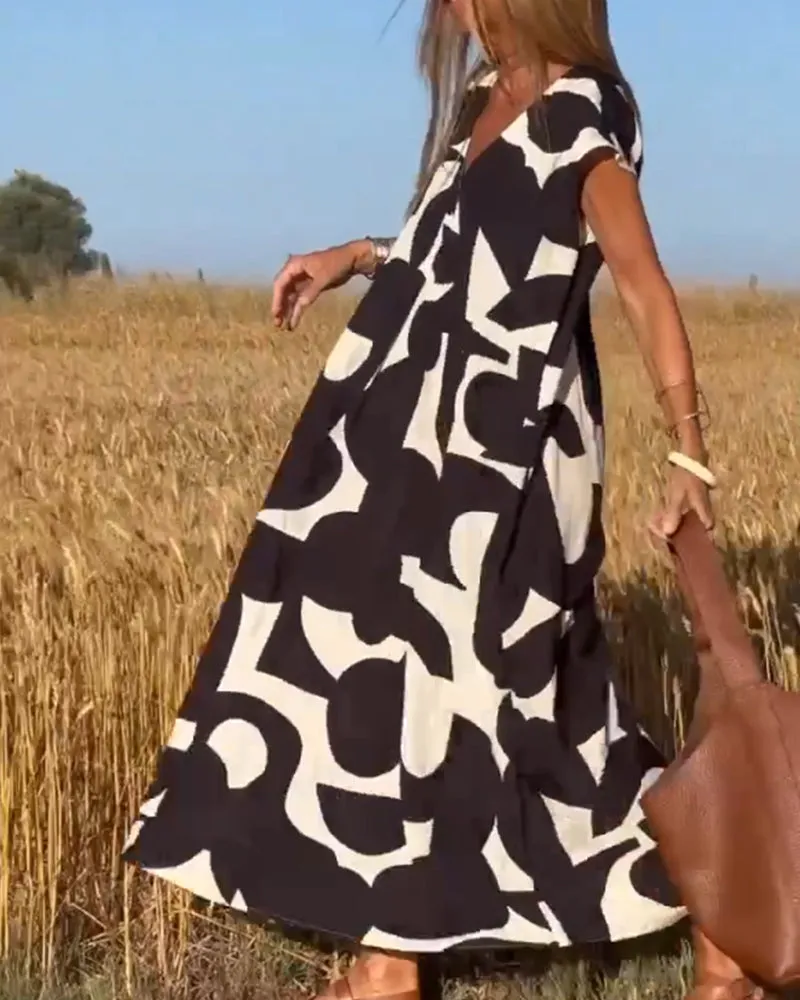 Stéphanie - Printed dress with V-neck